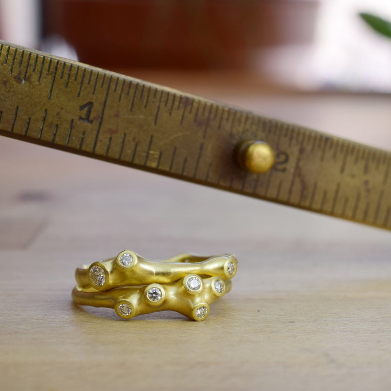 Barnacle Ring Stack by Johnny Ninos of Ninos Studio. Gold Stacking Rings.