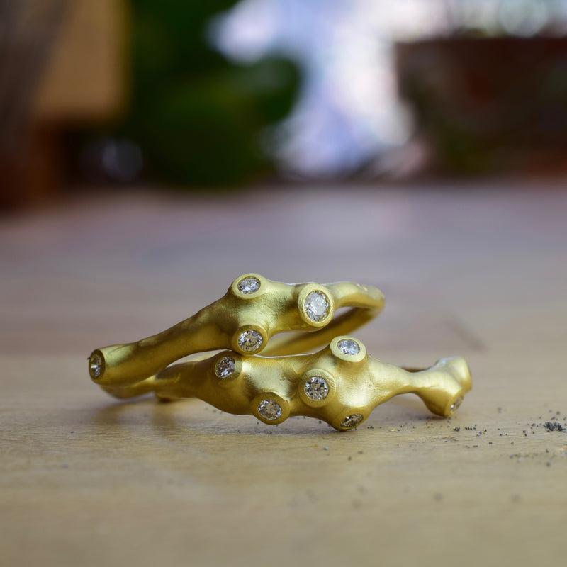Barnacle Stacking Rings by Johnny Ninos. Available at Ninos Studio.
