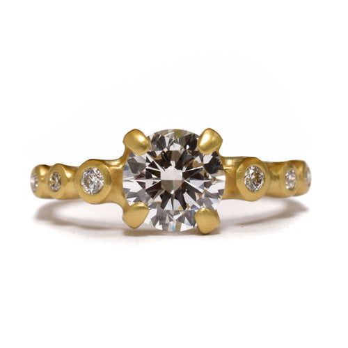 Prong Set Diamond Engagement Ring with Symmetrical Diamonds