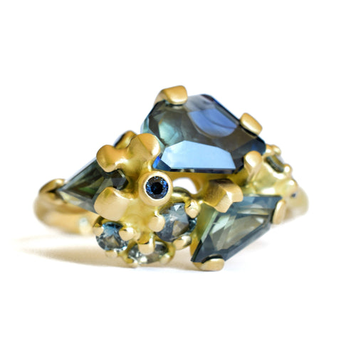 18k yellow gold Tidepool Ring with a variety of blue, aqua, and green sapphires.