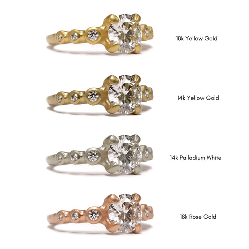 Prong Set Diamond Engagement Ring with Symmetrical Diamonds