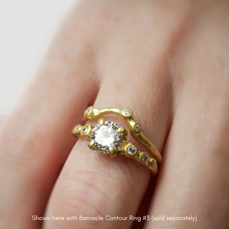 Prong Set Diamond Engagement Ring with Symmetrical Diamonds