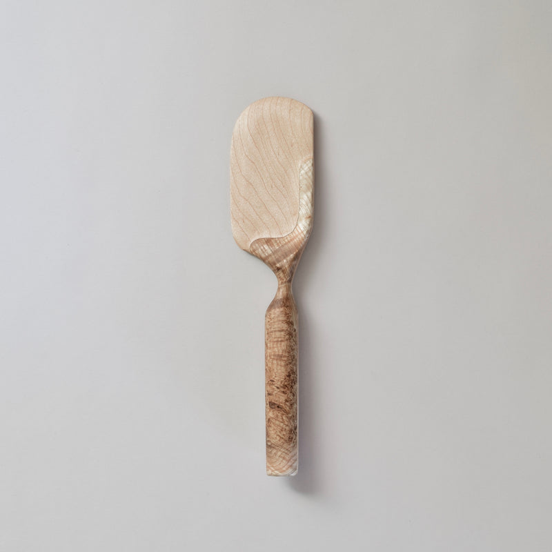 Handcrafted cheese knife using figured elm burl and maple. Handmade by Johnny Ninos of Ninos Studio. 