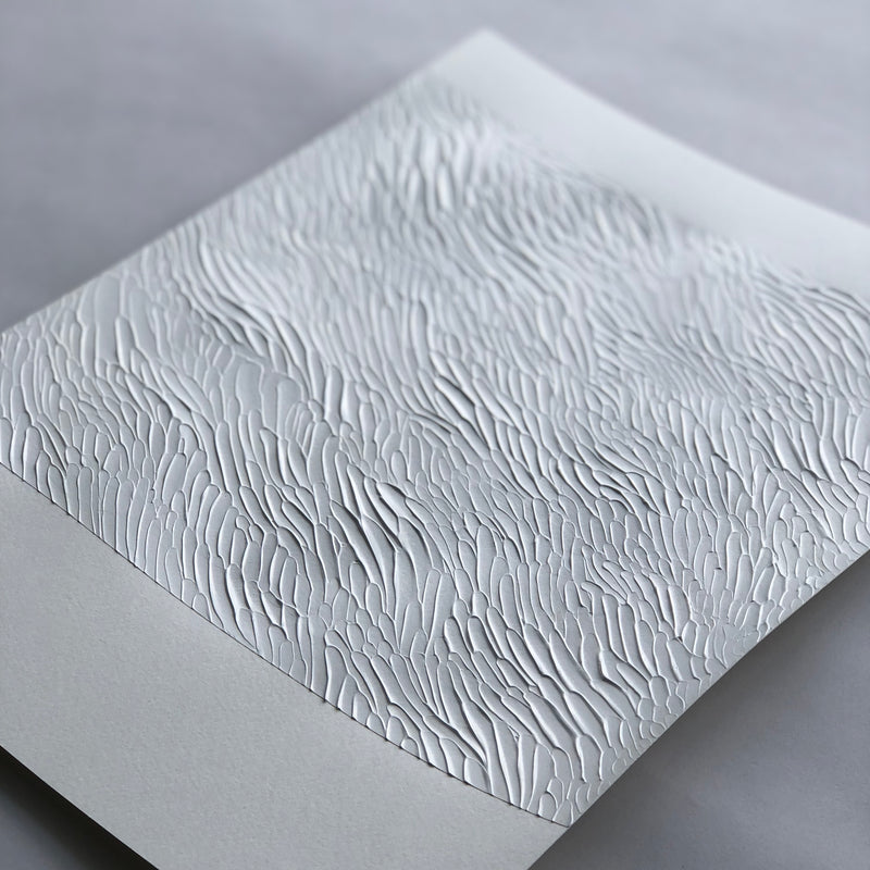 White textural art study on paper by Ninos Studio