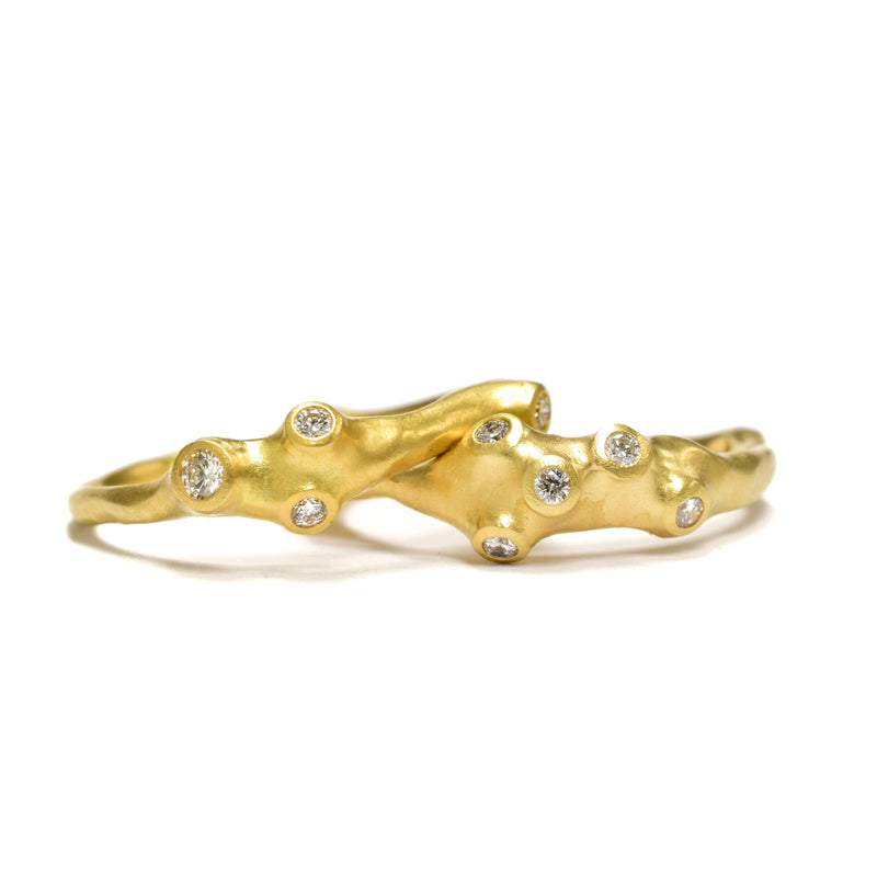 Barnacle Stacking Rings by Johnny Ninos. Available at Ninos Studio. 