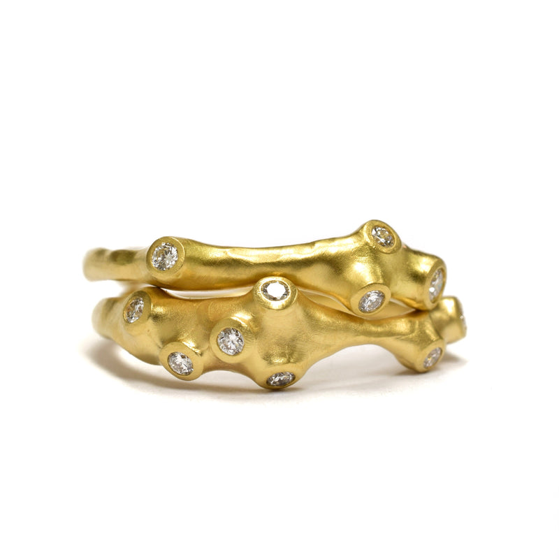 Barnacle Stacking Rings by Johnny Ninos. Available at Ninos Studio. 