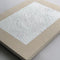 White Textured Painting on Raw Canvas by Ninos Studio