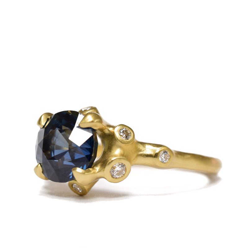 Blue Sapphire Ring prong set in 18k gold. Available at Ninos Studio. 