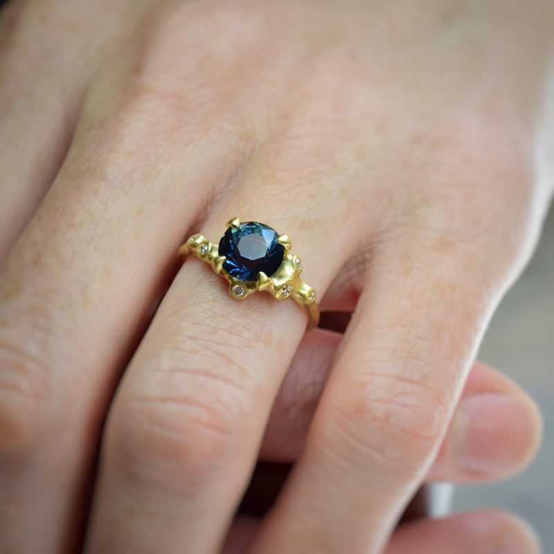 Blue Sapphire Ring prong set in 18k gold. Available at Ninos Studio. 