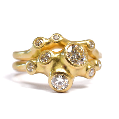 Large Barnacle Stacking Ring Set in 18l gold. Custom options available at Ninos Studio. 